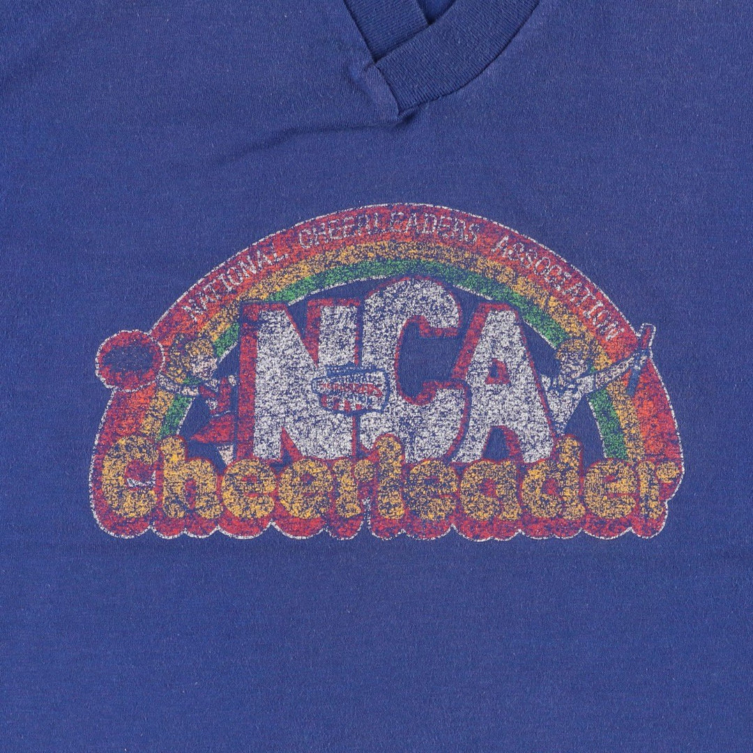 70s-era Cheerleader Supply Co., Inc. (NCA) V-neck sports print T-shirt, Made in USA, Men's size S (approx.) cotton blue type Vintage Second Hand