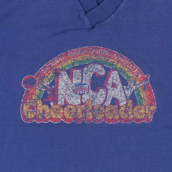 70s-era Cheerleader Supply Co., Inc. (NCA) V-neck sports print T-shirt, Made in USA, Men's size S (approx.) cotton blue type Vintage Second Hand