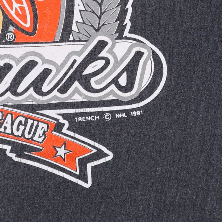 90'S TRENCH NHL CHICAGO BLACKHAWKS Logo Print T-Shirt, Made in USA, Men's XXL equivalent, Vintage polyester black type Vintage Second Hand