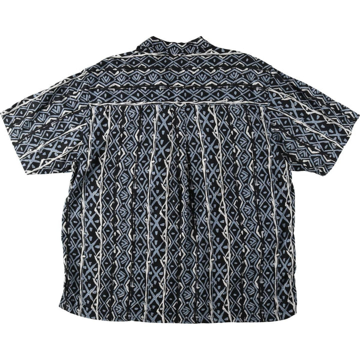 GREG NORMAN all-over print open collar short-sleeved rayon shirt, boxy fit, men's size XL. Rayon black type Vintage Second Hand
