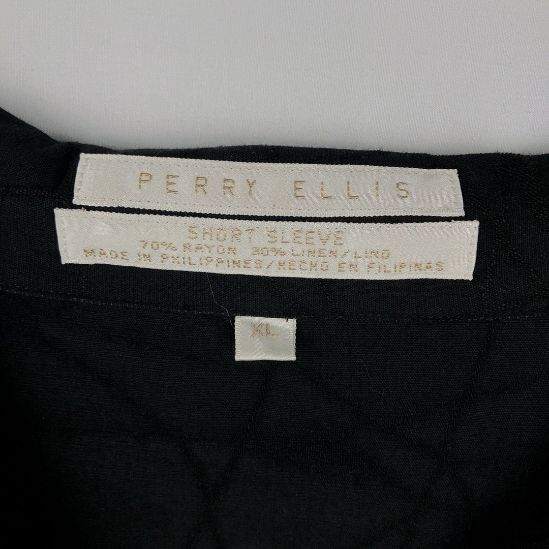 Perry Ellis all-over print short-sleeved open-collar rayon shirt, boxy fit, men's size XL equivalent. Rayon black type Vintage Second Hand