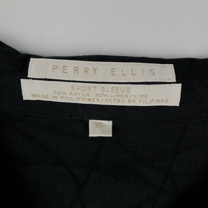 Perry Ellis all-over print short-sleeved open-collar rayon shirt, boxy fit, men's size XL equivalent. Rayon black type Vintage Second Hand
