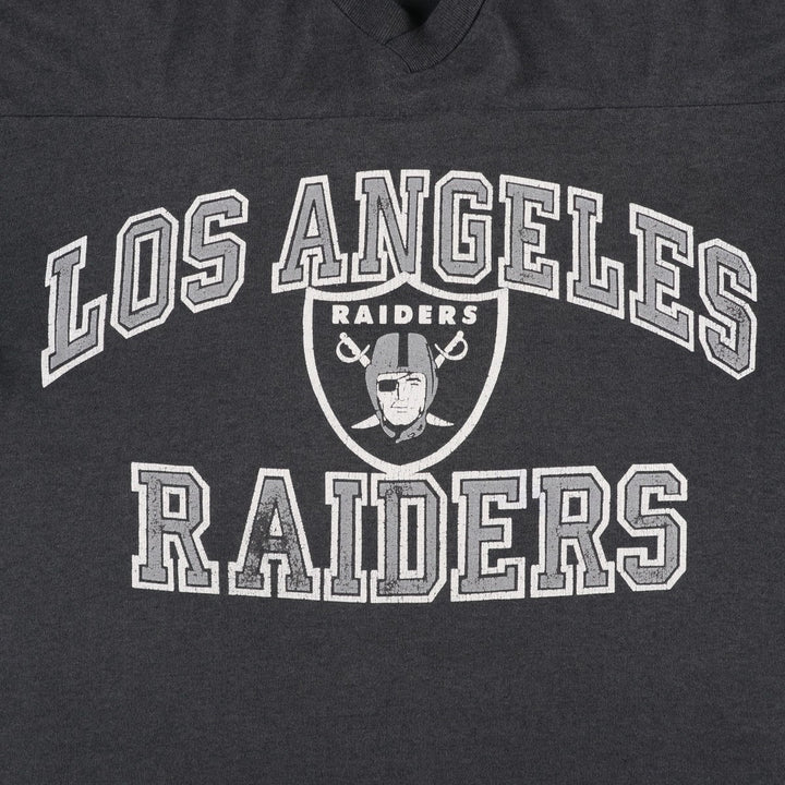 1990'S NFL Los Angeles Raiders V-neck football 3/4 sleeve t-shirt, men's size M equivalent, vintage. unclear black type Vintage Second Hand