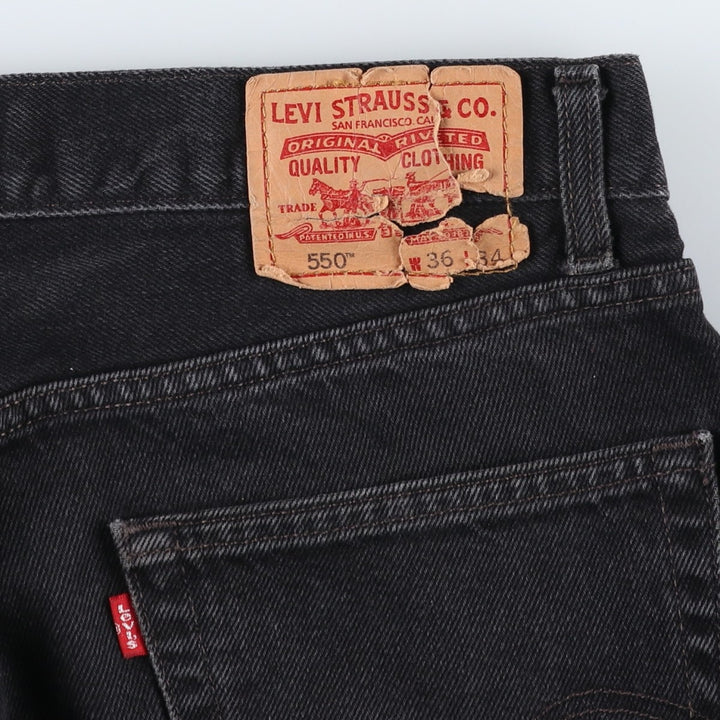 Levi's 550 Regular Fit Black Denim Tapered Jeans (Men's W36 equivalent) cotton black type Vintage Second Hand