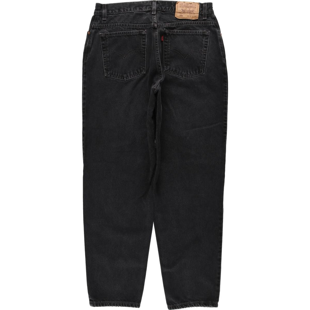 90'S Levi's 550 Relaxed Fit Tapered Black Denim Pants, Made in the USA, Men's Size 33, Vintage cotton black type Vintage Second Hand