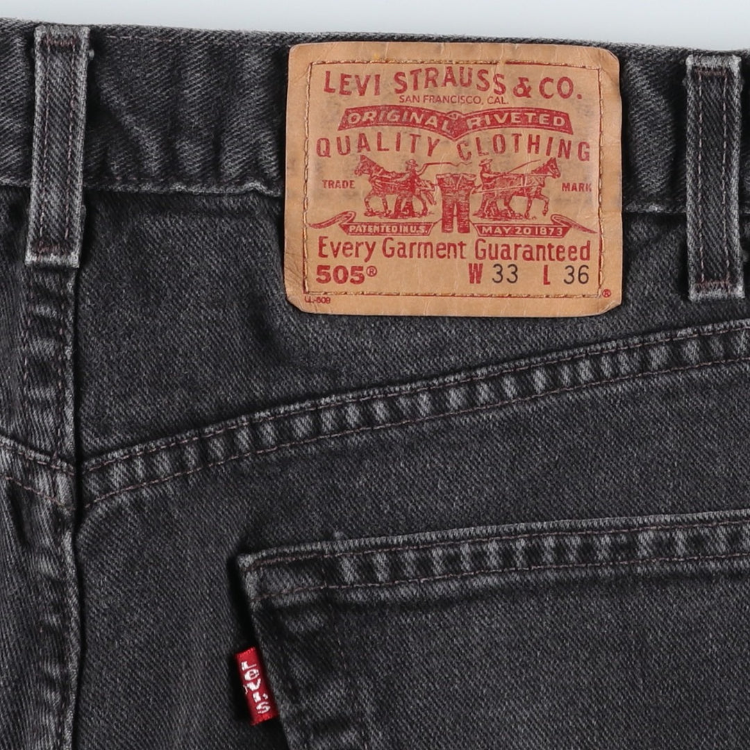 00'S Levi's 505 REGULAR FIT STRAIGHT LEG black denim tapered denim pants for men, size w32 cotton Charcoal Vintage Second Hand