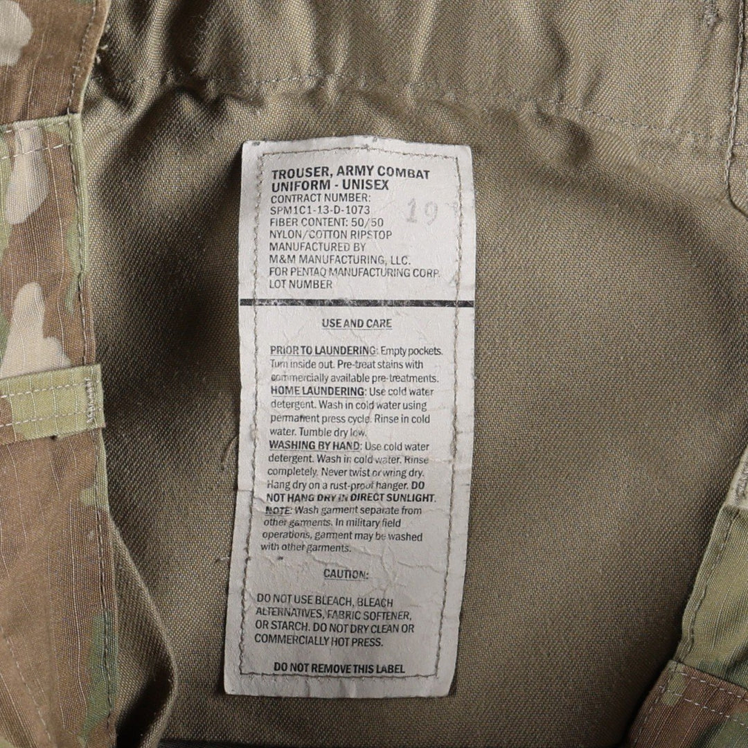 Genuine US military surplus Multicam camouflage pattern ripstop military cargo pants/combat pants, made in the USA, men's size W31 equivalent. Nylon Khaki type Vintage Second Hand