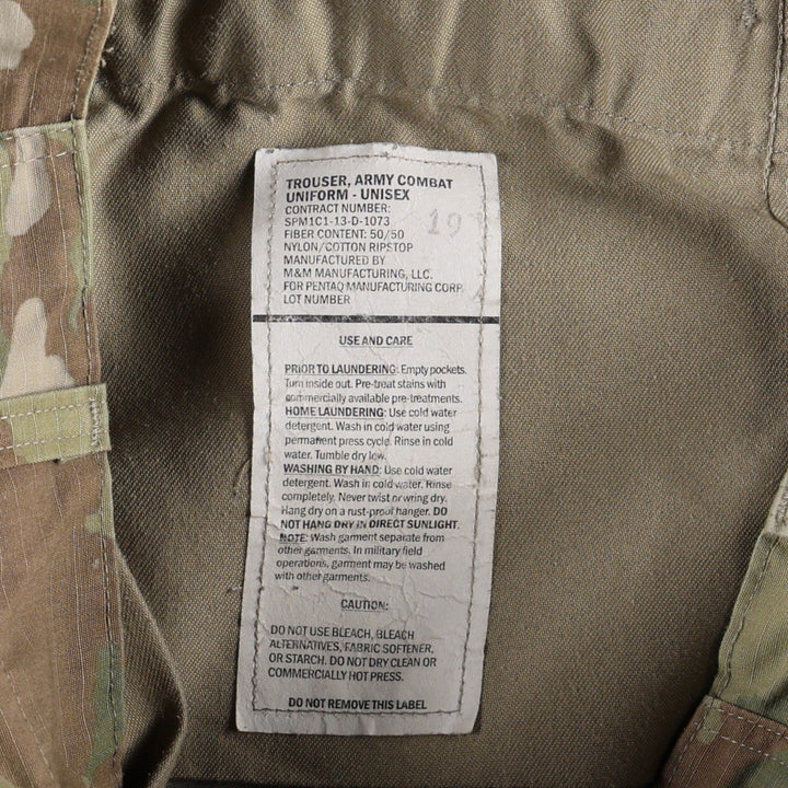 Genuine US military surplus Multicam camouflage pattern ripstop military cargo pants/combat pants, made in the USA, men's size W31 equivalent. Nylon Khaki type Vintage Second Hand