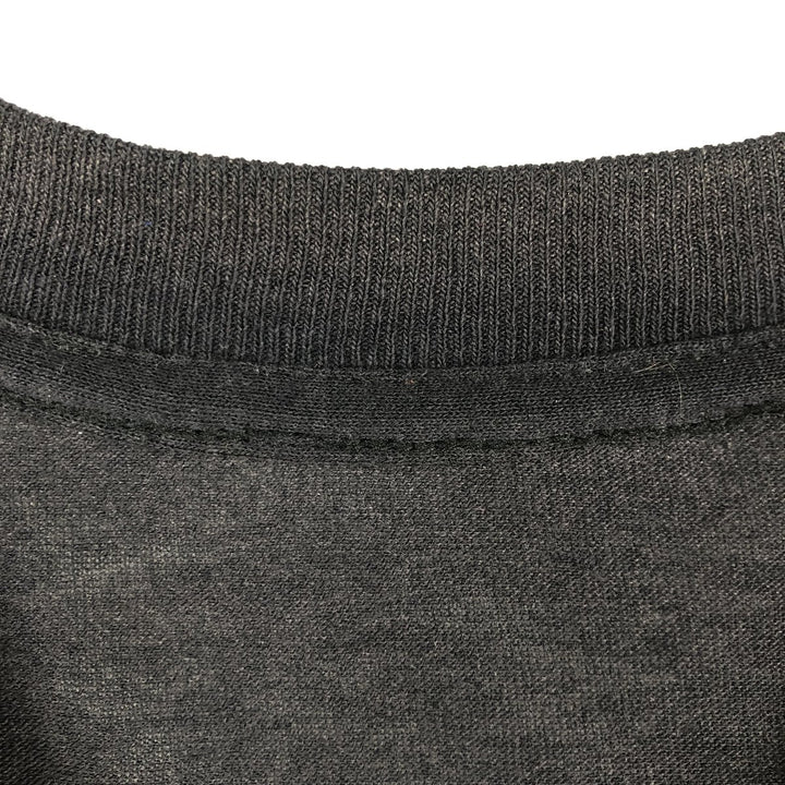 Vintage 90'S printed T-shirt, men's size M equivalent, single stitching. unclear black type Vintage Second Hand
