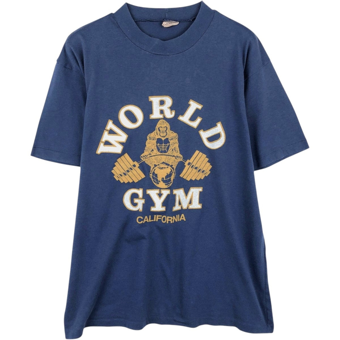 80'S Dinar T-Shirts WORLD GYM Advertising T-Shirt, Made in Canada, Men's XL equivalent, Vintage polyester navy blue type Vintage Second Hand