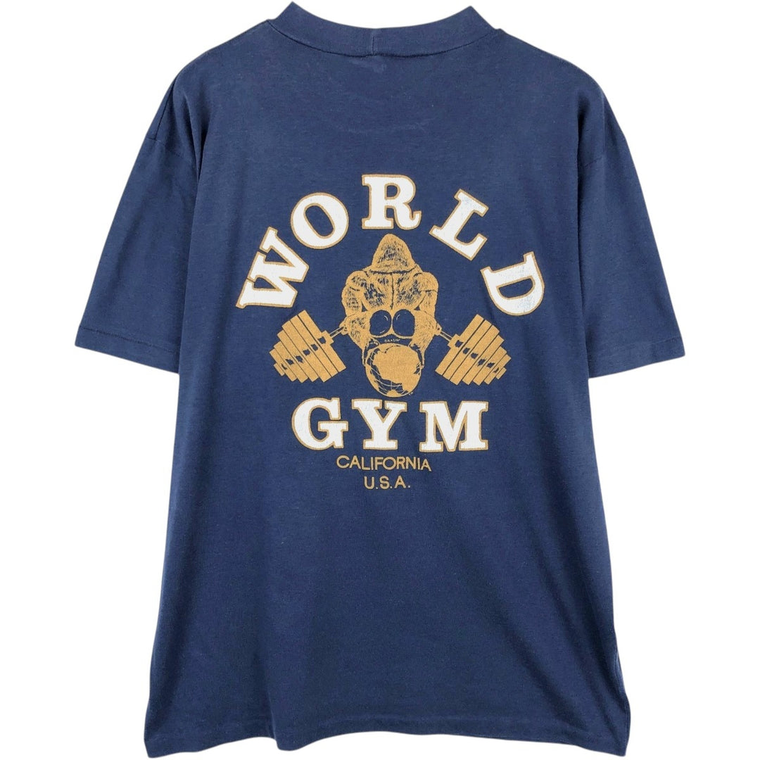 80'S Dinar T-Shirts WORLD GYM Advertising T-Shirt, Made in Canada, Men's XL equivalent, Vintage polyester navy blue type Vintage Second Hand