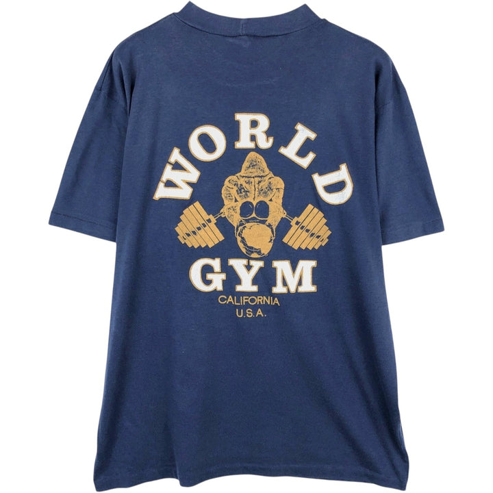 80'S Dinar T-Shirts WORLD GYM Advertising T-Shirt, Made in Canada, Men's XL equivalent, Vintage polyester navy blue type Vintage Second Hand