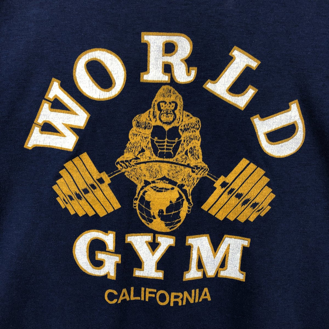 80'S Dinar T-Shirts WORLD GYM Advertising T-Shirt, Made in Canada, Men's XL equivalent, Vintage polyester navy blue type Vintage Second Hand