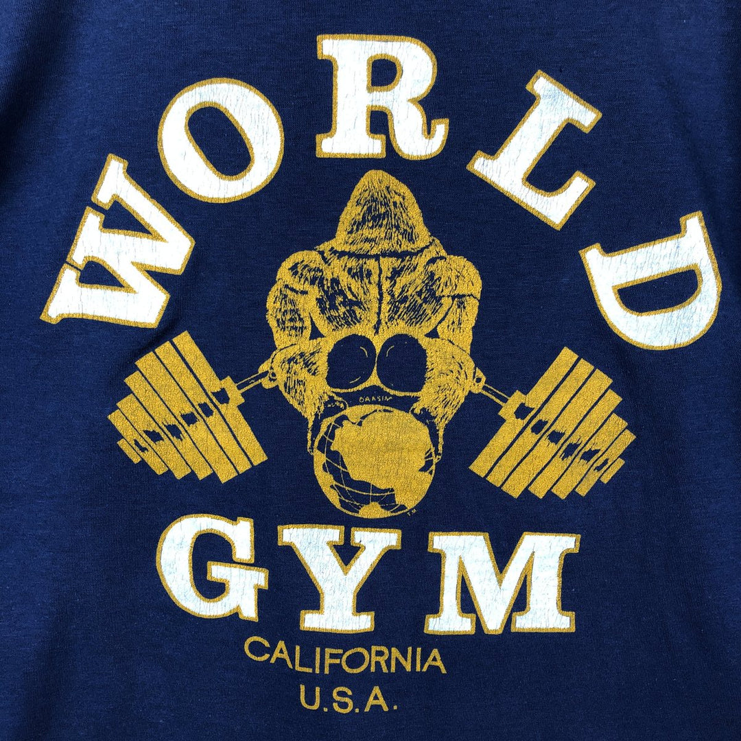 80'S Dinar T-Shirts WORLD GYM Advertising T-Shirt, Made in Canada, Men's XL equivalent, Vintage polyester navy blue type Vintage Second Hand