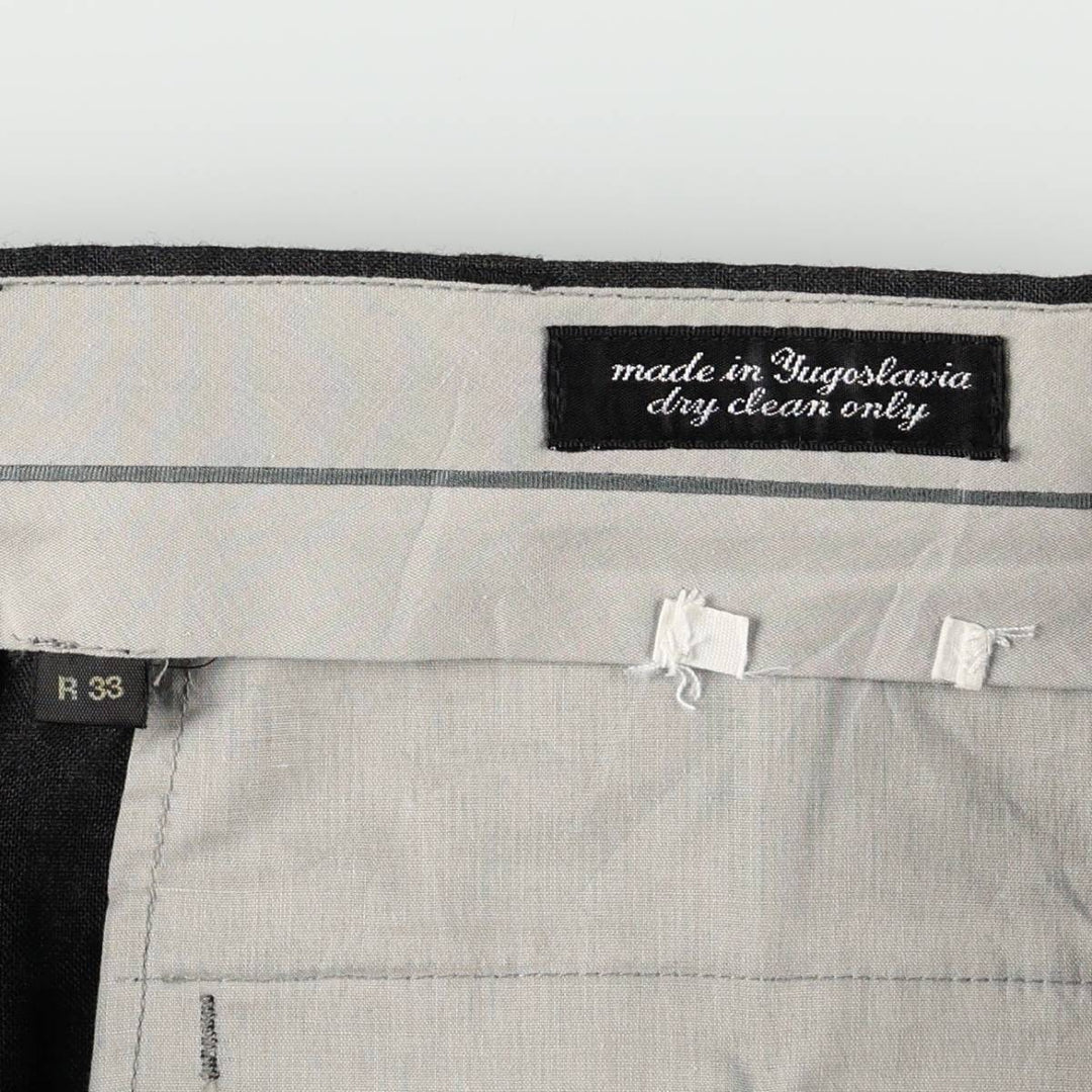 Two-pleat slacks pants for men, size W33 unclear Charcoal Vintage Second Hand