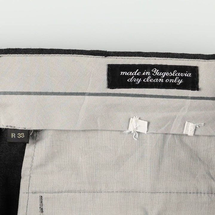 Two-pleat slacks pants for men, size W33 unclear Charcoal Vintage Second Hand