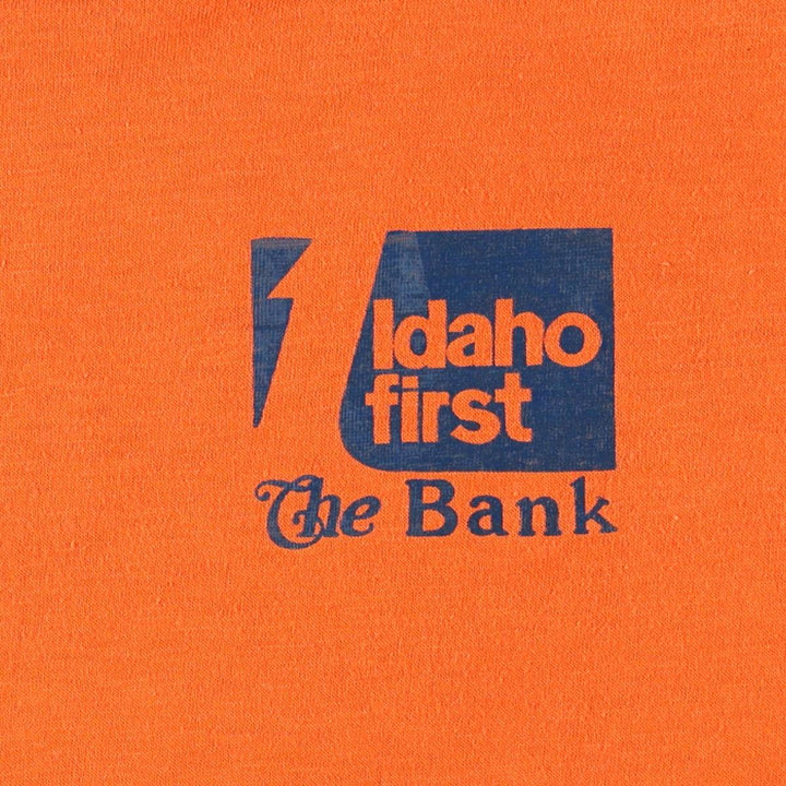 80'S TPLUS IDAHO FIRST BANK Denver Broncos Advertising T-Shirt, Women's Size M (Equivalent), Vintage polyester orange type Vintage Second Hand