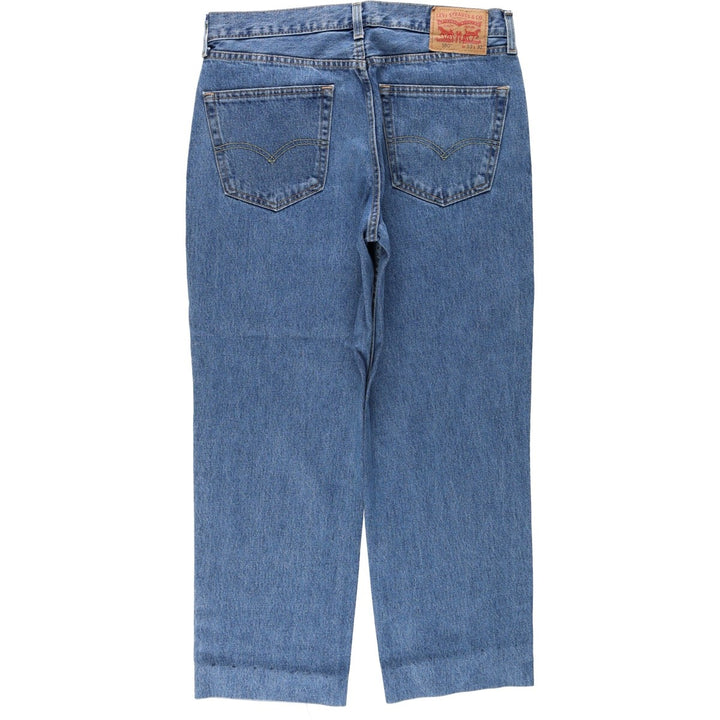 Levi's 550 tapered denim pants for men, size W34 cotton blue type Vintage Second Hand