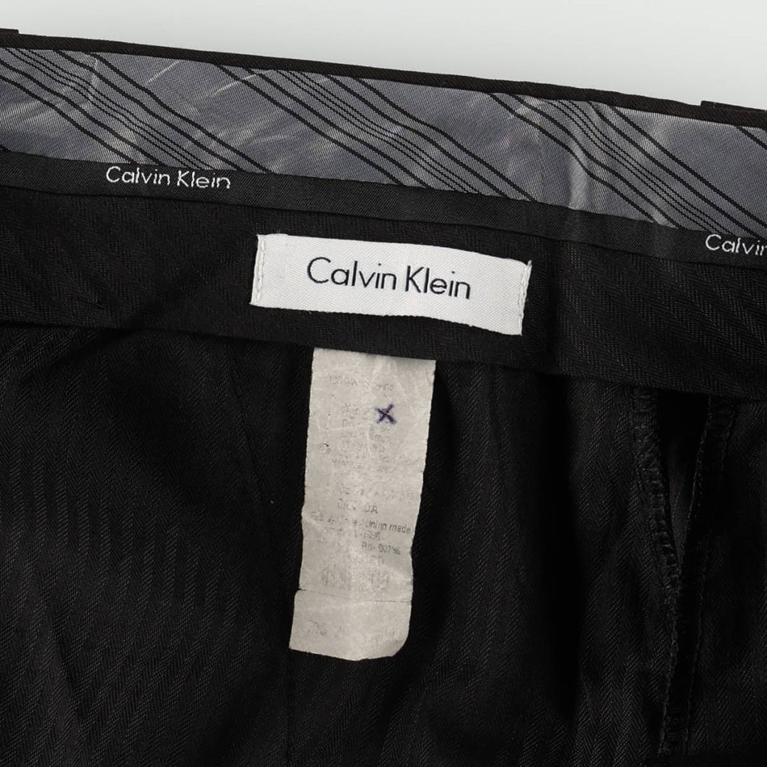 Calvin Klein striped pattern slacks pants, size 33W x 32L (equivalent to men's W34). unclear black type Vintage Second Hand
