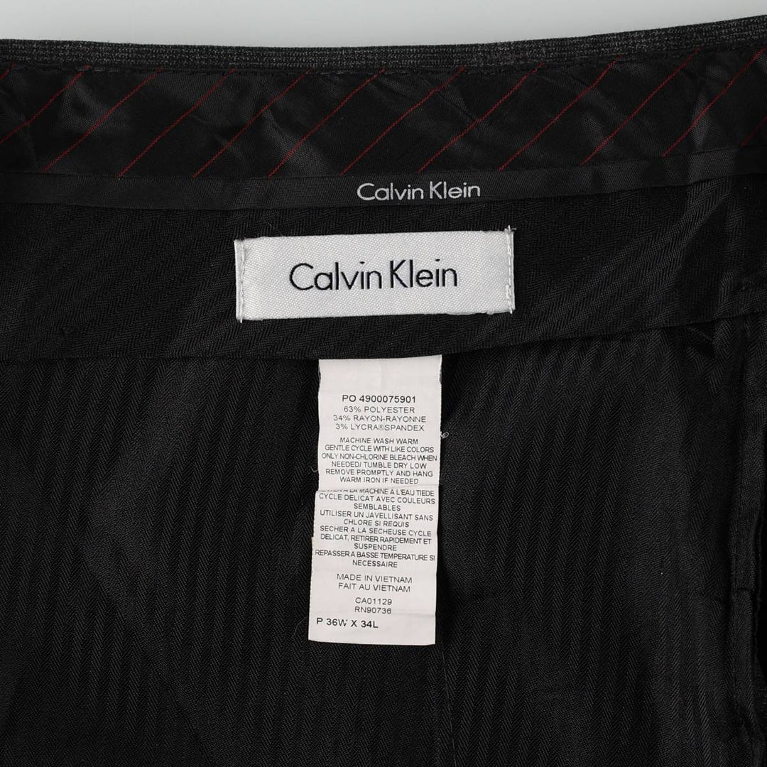 Calvin Klein check pattern slacks pants for men, equivalent to size W36. polyester gray type Vintage Second Hand