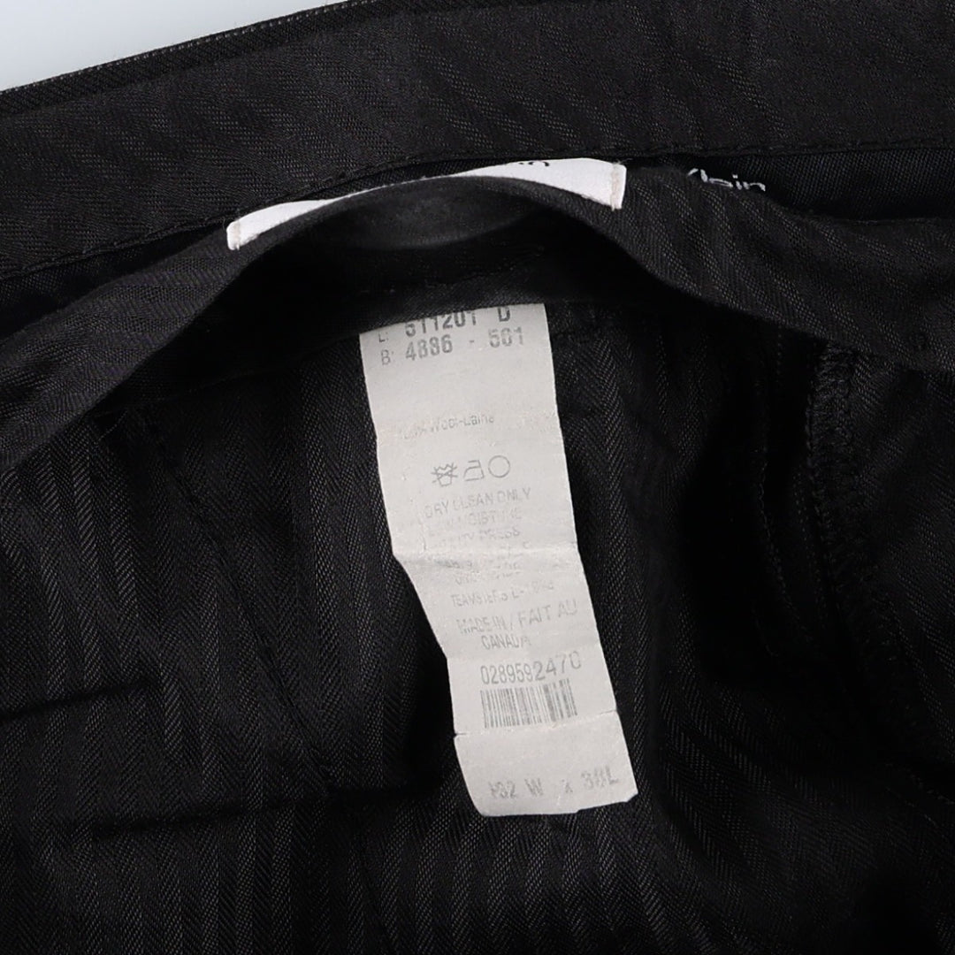 Calvin Klein striped wool trousers/slacks, made in Canada, men's size W32 (approx.). wool black type Vintage Second Hand