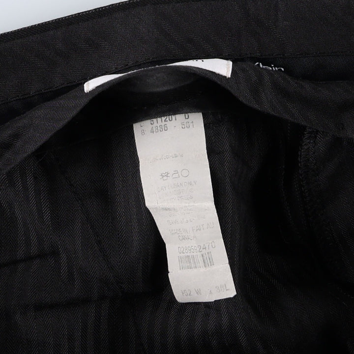 Calvin Klein striped wool trousers/slacks, made in Canada, men's size W32 (approx.). wool black type Vintage Second Hand