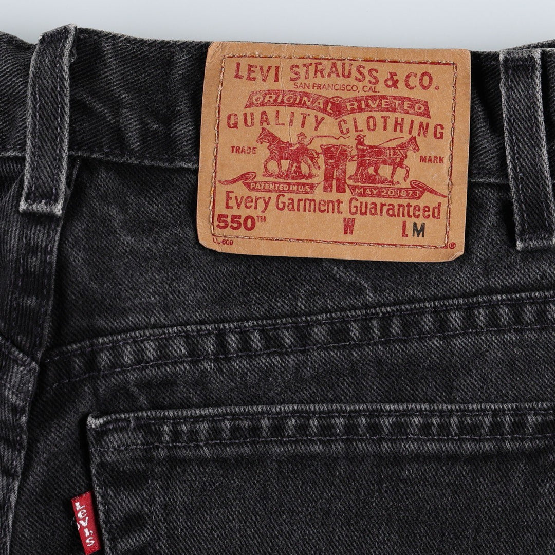 2000'S Levi's 550 Relaxed Fit Tapered Leg Black Denim Tapered Jeans, Women's Size L (W28 equivalent) cotton black type Vintage Second Hand