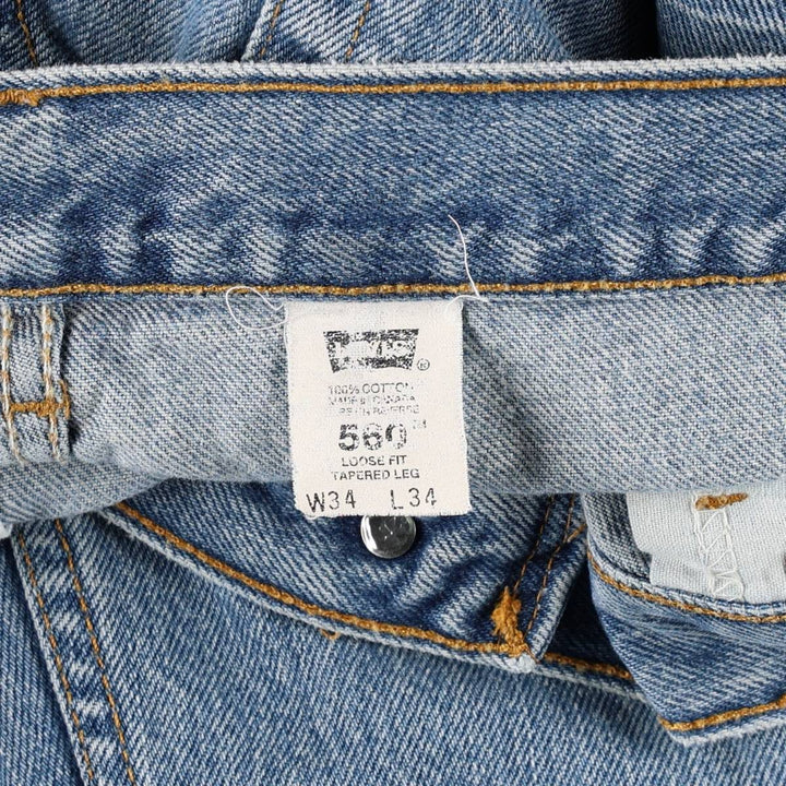 90'S Levi's 560 Loose Fit Tapered Leg Cut-off Tapered Denim Pants, Made in Canada, Men's W35 (approx.), Vintage cotton blue type Vintage Second Hand