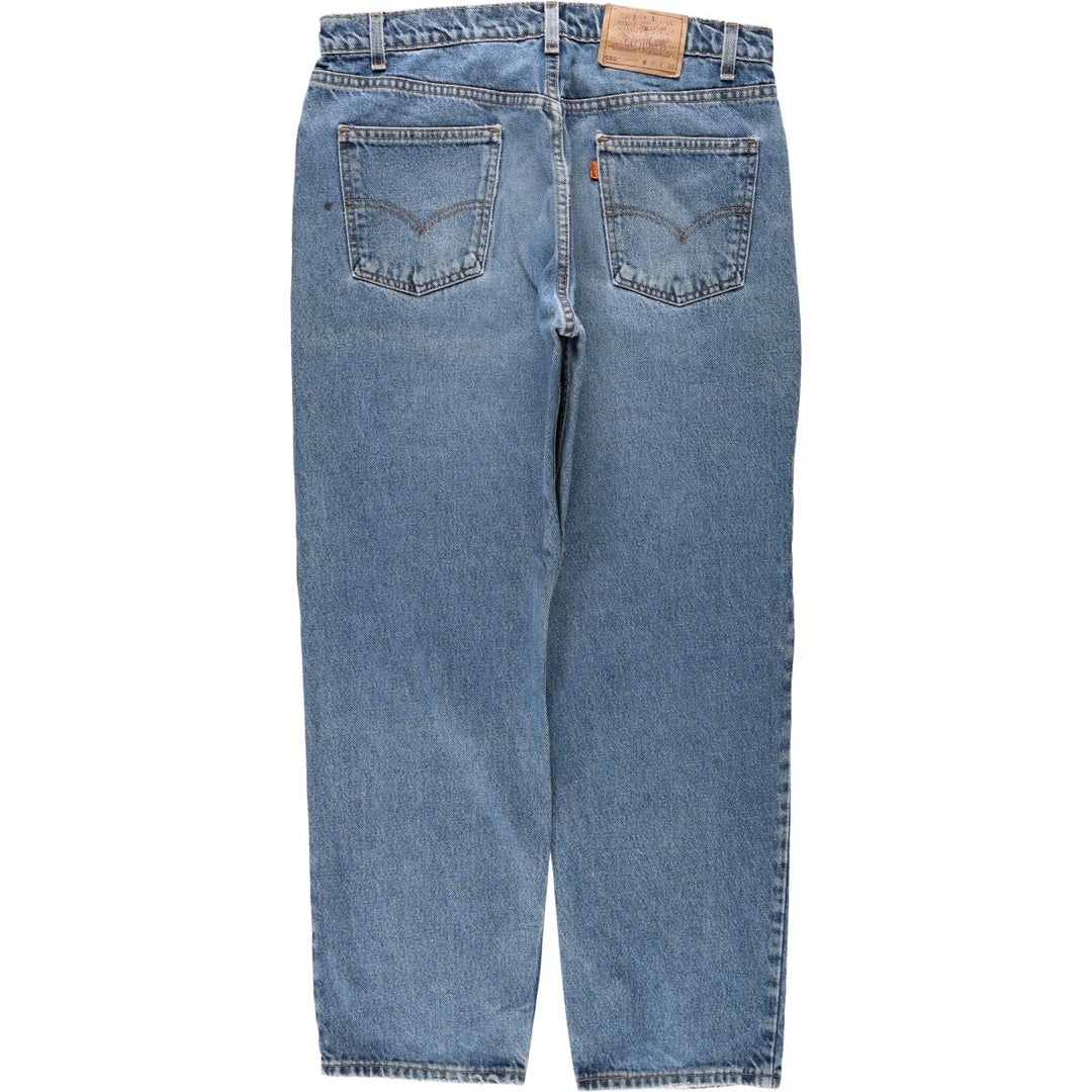 1990'S Levi's 560 Relaxed Fit Orange Tab Tapered Denim Pants, Made in USA, Men's W35 (approx.), Vintage cotton blue type Vintage Second Hand