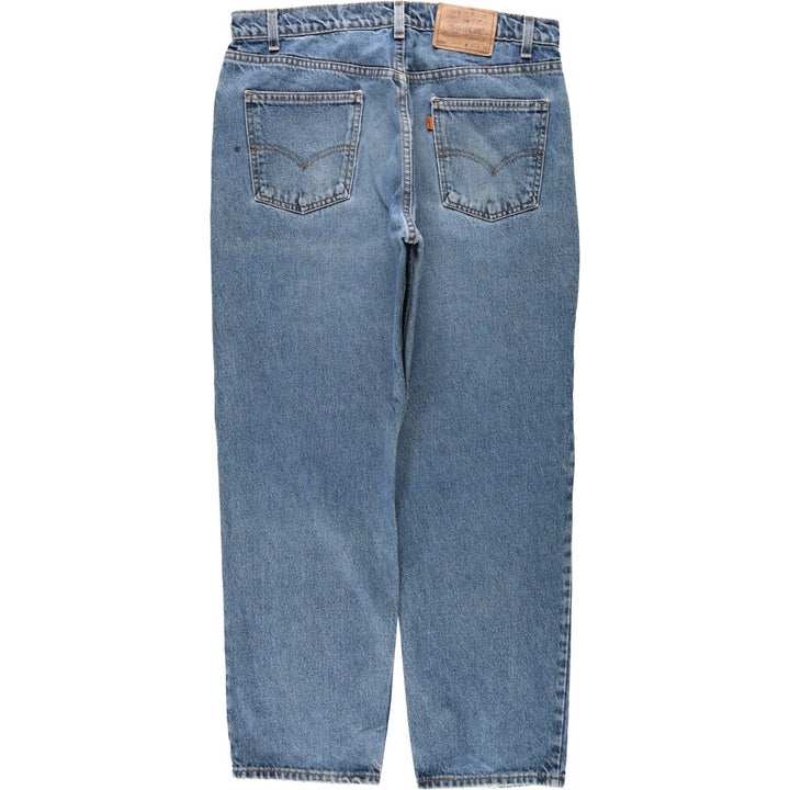 1990'S Levi's 560 Relaxed Fit Orange Tab Tapered Denim Pants, Made in USA, Men's W35 (approx.), Vintage cotton blue type Vintage Second Hand