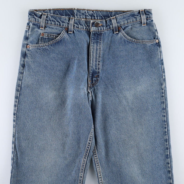 1990'S Levi's 560 Relaxed Fit Orange Tab Tapered Denim Pants, Made in USA, Men's W35 (approx.), Vintage cotton blue type Vintage Second Hand