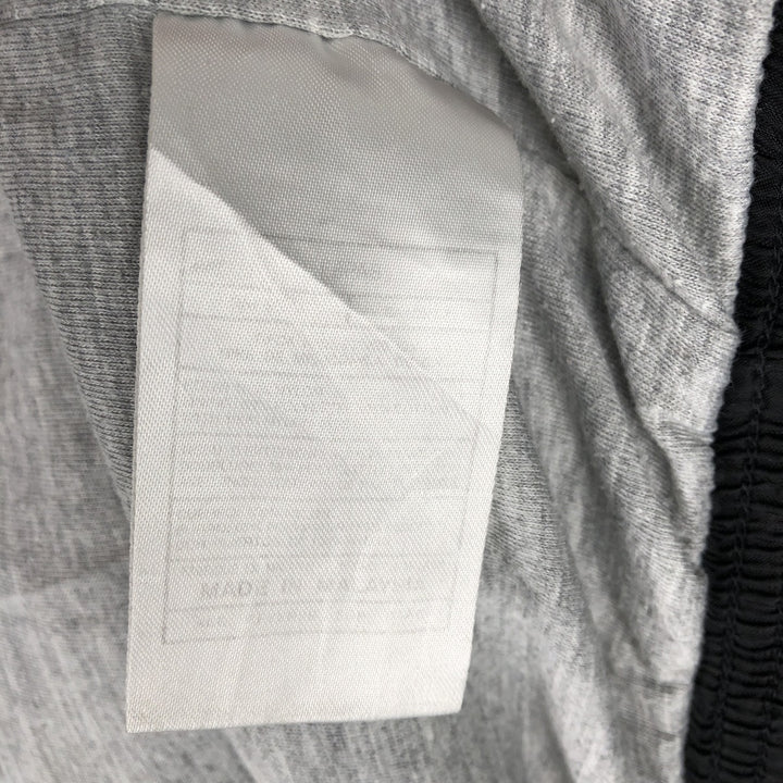 90s-era Nike nylon jacket, men's size XL equivalent, vintage. Nylon black type Vintage Second Hand