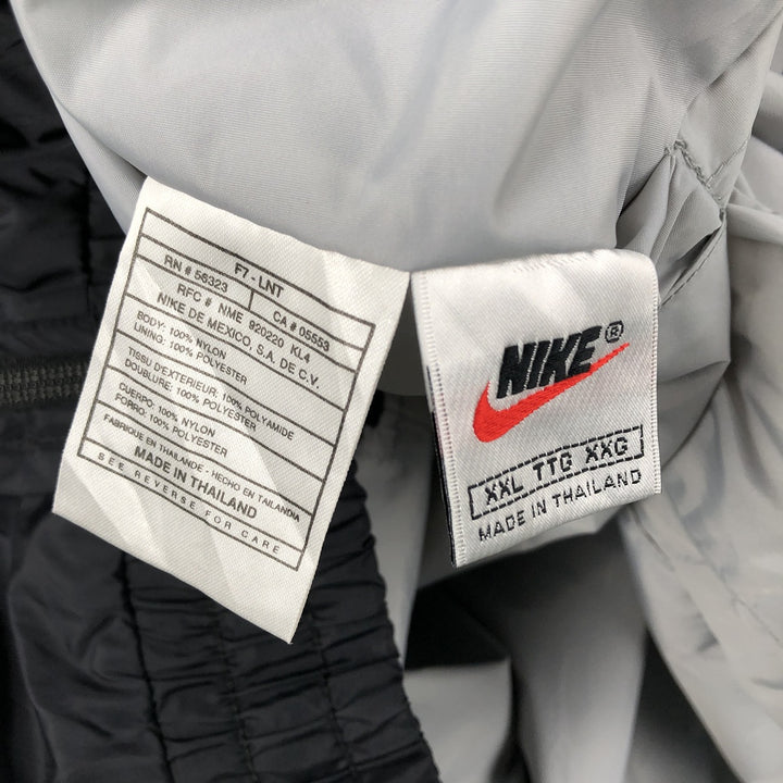 90s-era Nike NFL Las Vegas Raiders Reversible V-Neck Nylon Pullover, Men's XXL equivalent, Vintage Nylon gray type Vintage Second Hand