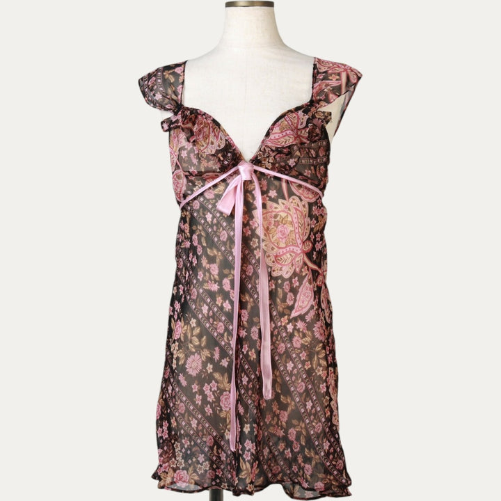 Flora all-over floral print half-length tunic with ruffles and ribbons, sheer, sleeveless, women's size S. unclear black type Vintage Second Hand