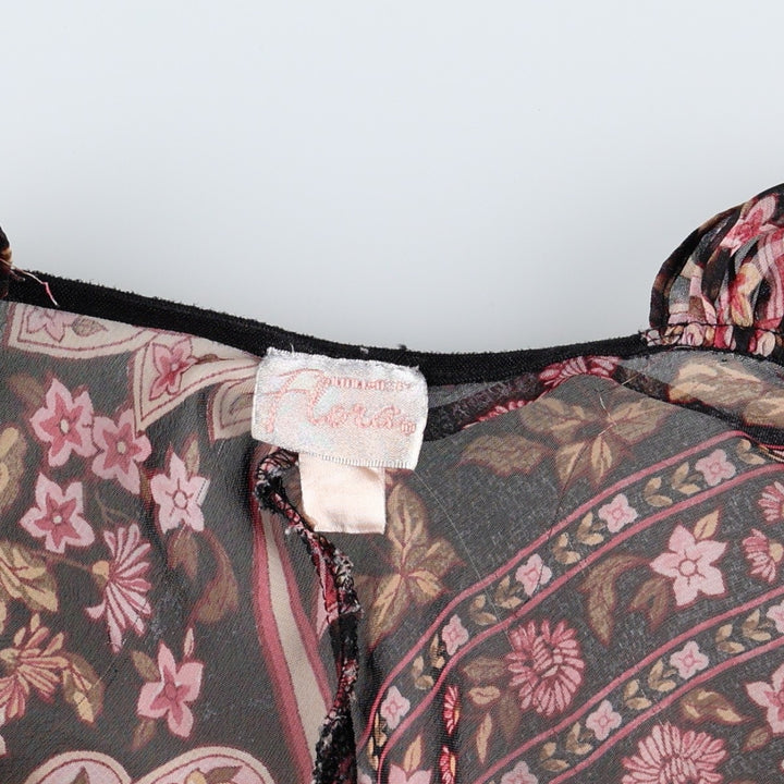 Flora all-over floral print half-length tunic with ruffles and ribbons, sheer, sleeveless, women's size S. unclear black type Vintage Second Hand