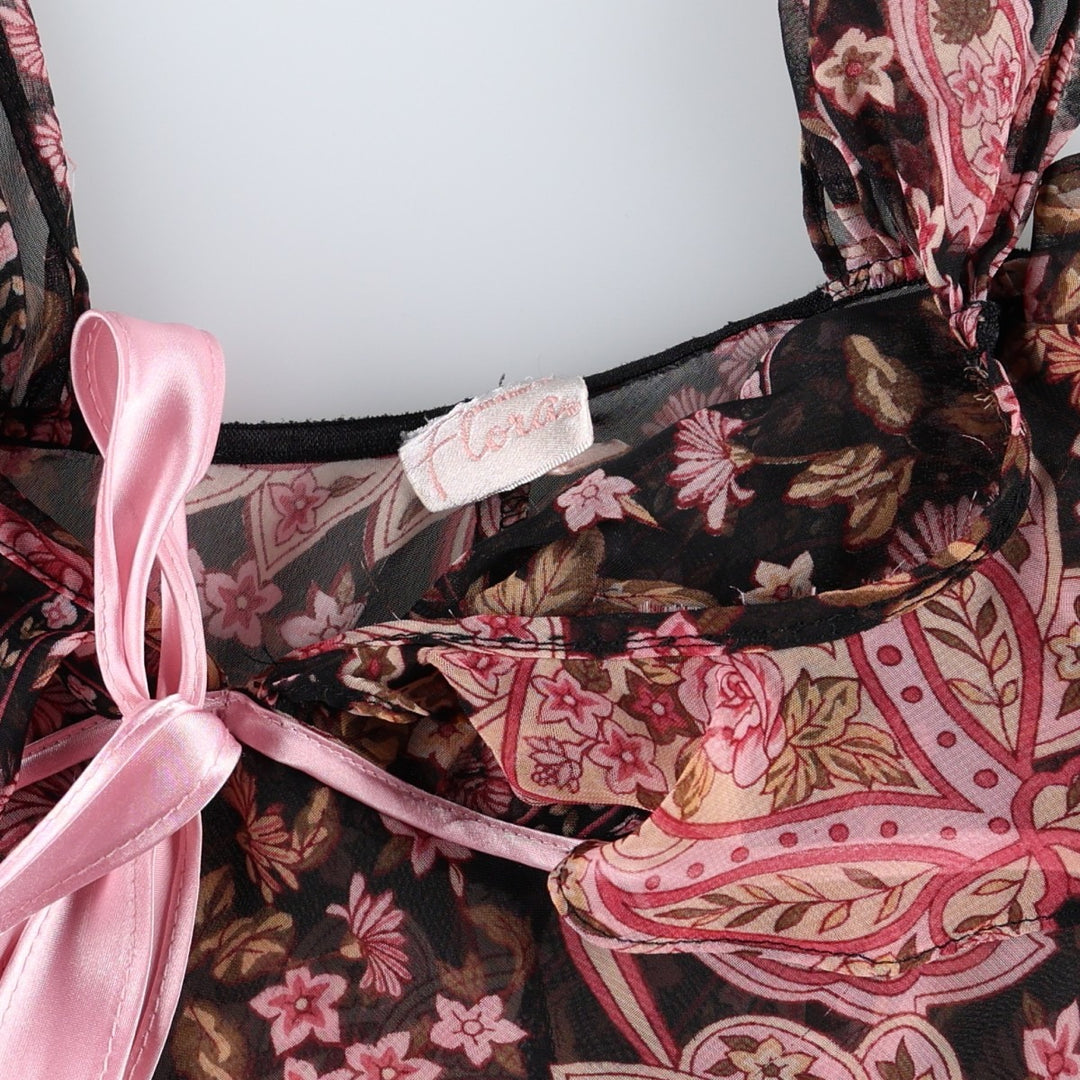 Flora all-over floral print half-length tunic with ruffles and ribbons, sheer, sleeveless, women's size S. unclear black type Vintage Second Hand