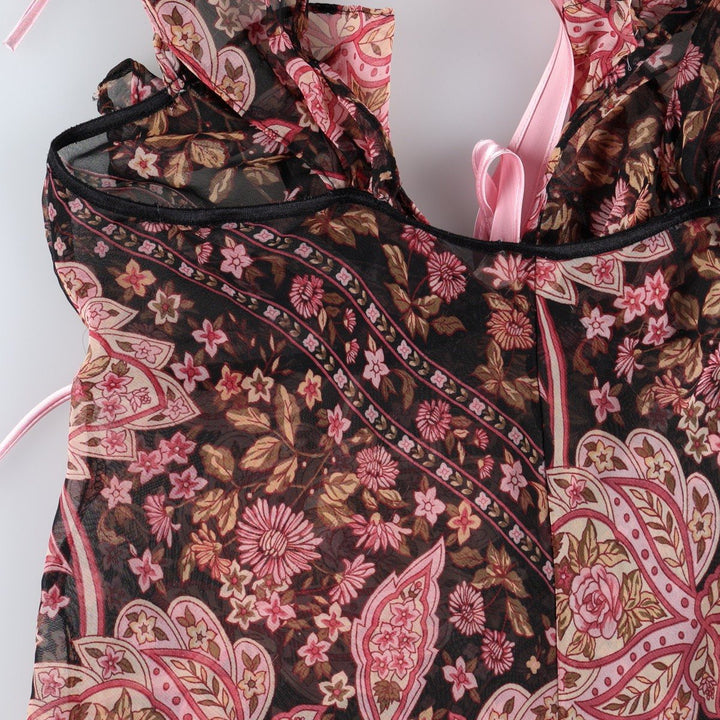Flora all-over floral print half-length tunic with ruffles and ribbons, sheer, sleeveless, women's size S. unclear black type Vintage Second Hand