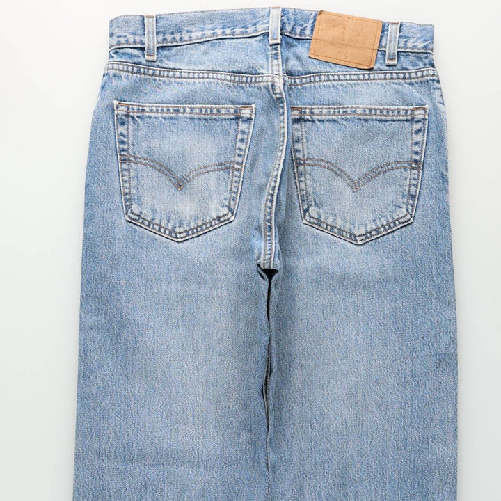 00'S Levi's 505 REGULAR FIT STRAIGHT LEG tapered denim pants made in USA, men's size w32 cotton blue type Vintage Second Hand