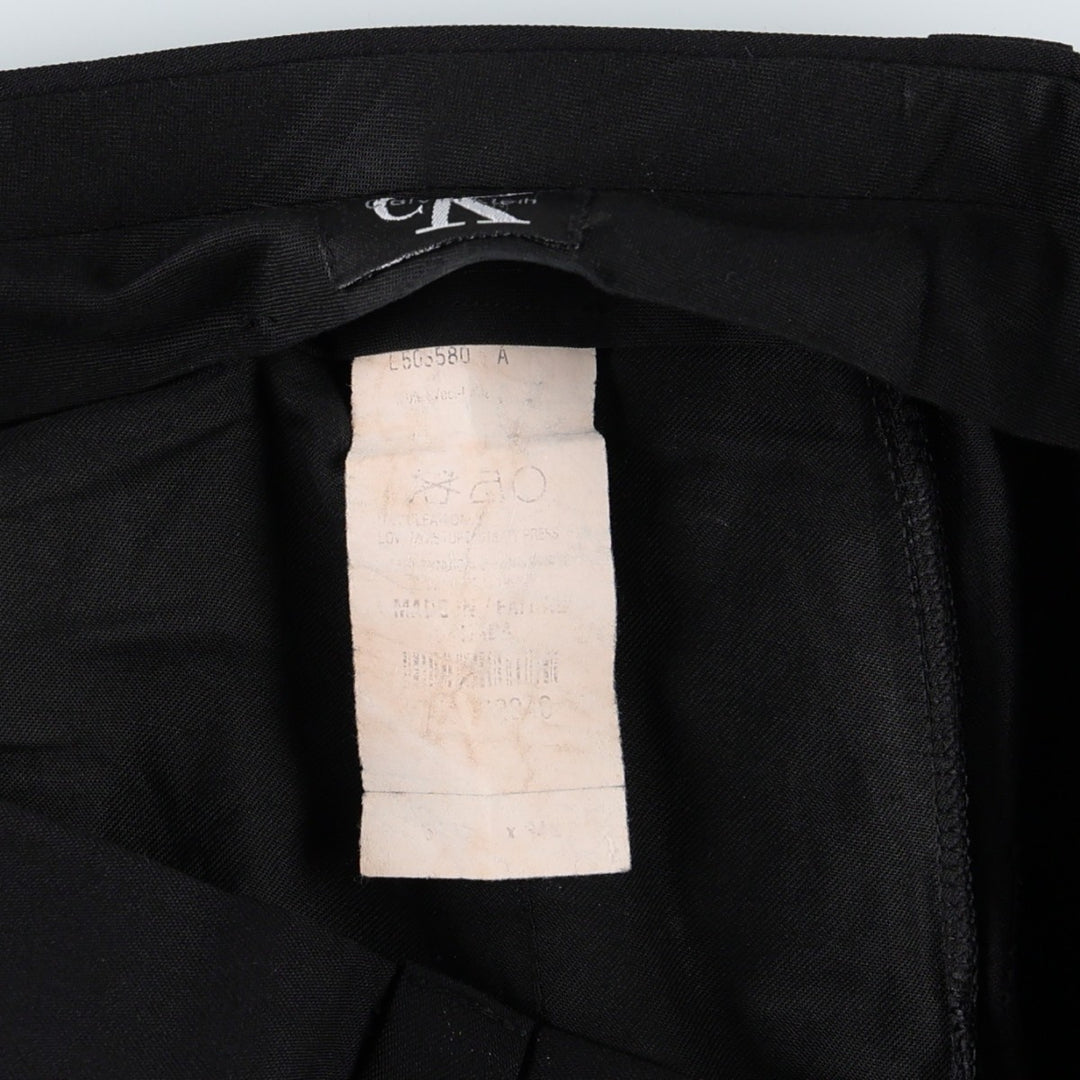 Calvin Klein one-tuck slacks, made in the USA, men's size W34 (approx.). unclear black type Vintage Second Hand