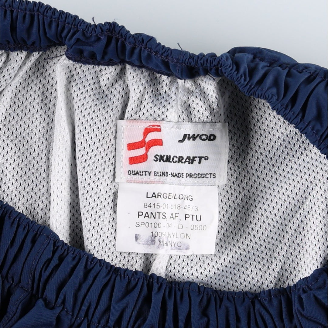 Authentic US military issue, 2000'S SKILCRAFT PTU training pants, nylon pants, windbreaker style, made in USA, large size. Nylon navy blue type Vintage Second Hand