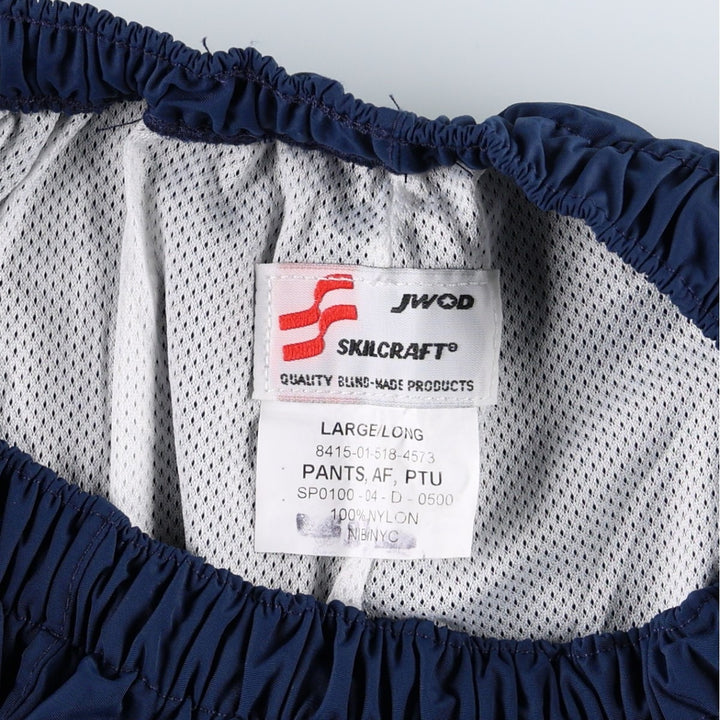 Authentic US military issue, 2000'S SKILCRAFT PTU training pants, nylon pants, windbreaker style, made in USA, large size. Nylon navy blue type Vintage Second Hand