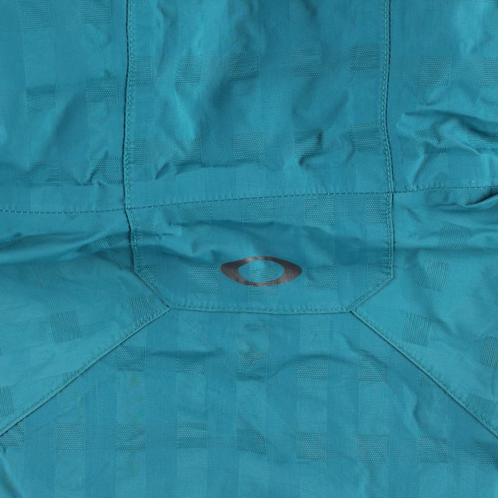 Oakley LOOSE FIT Insulated Puffer Jacket (Men's XL equivalent) Nylon turquoise blue Vintage Second Hand