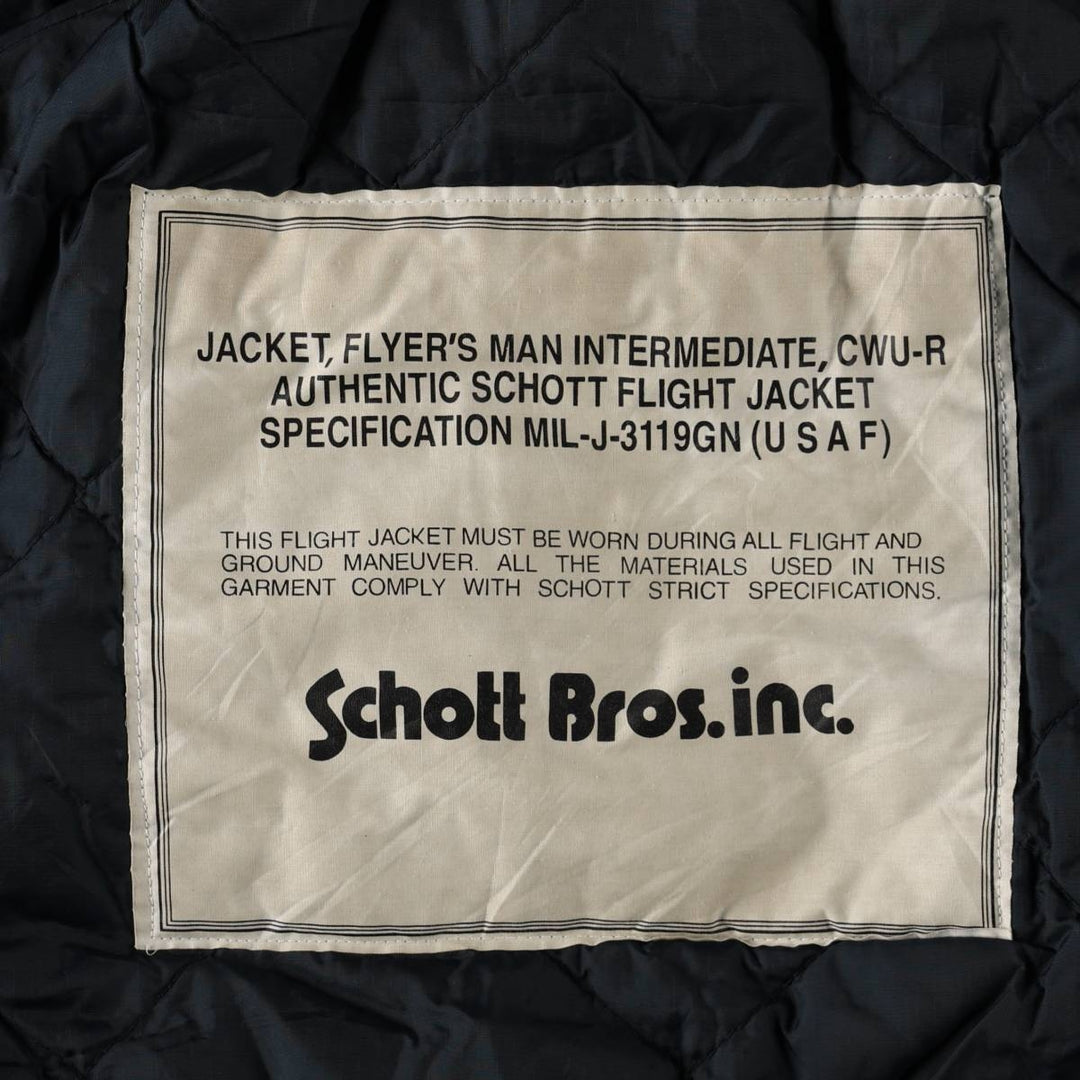 Civilian-made Schott CWU-type padded military flight jacket, men's size XL equivalent. Nylon navy blue type Vintage Second Hand