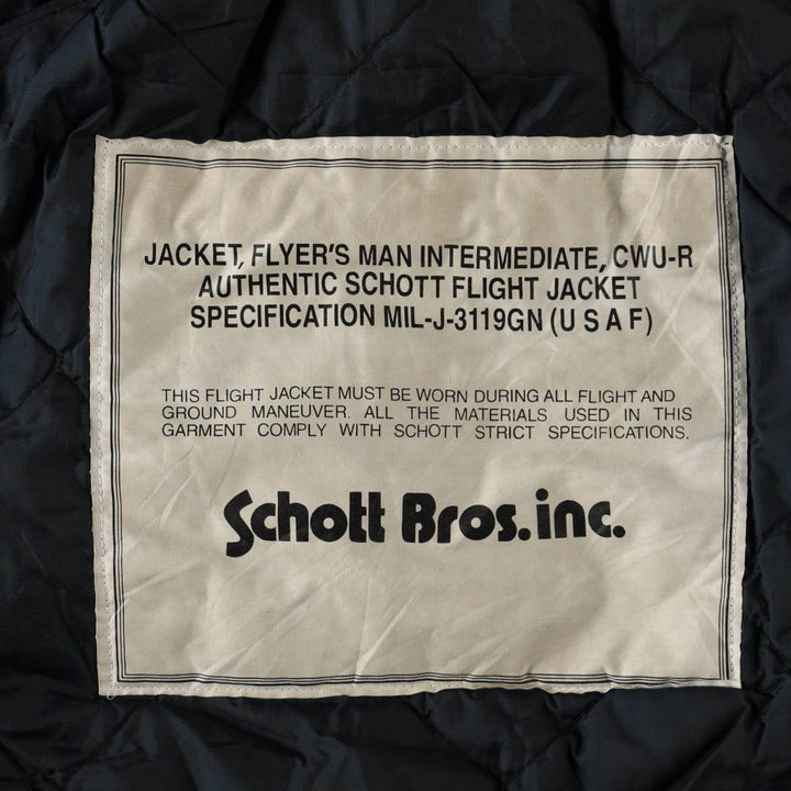 Civilian-made Schott CWU-type padded military flight jacket, men's size XL equivalent. Nylon navy blue type Vintage Second Hand