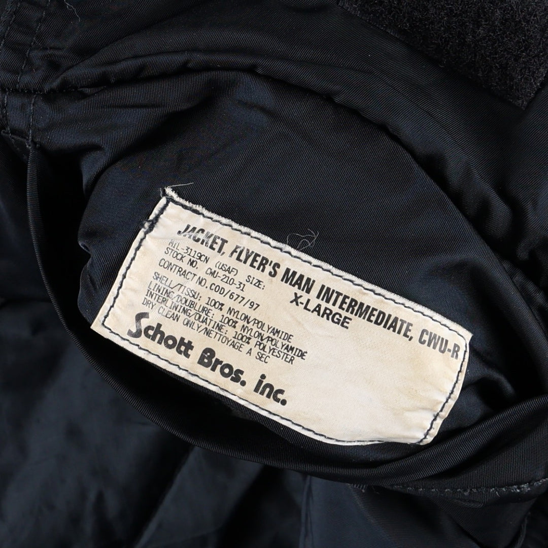 Civilian-made Schott CWU-type padded military flight jacket, men's size XL equivalent. Nylon navy blue type Vintage Second Hand