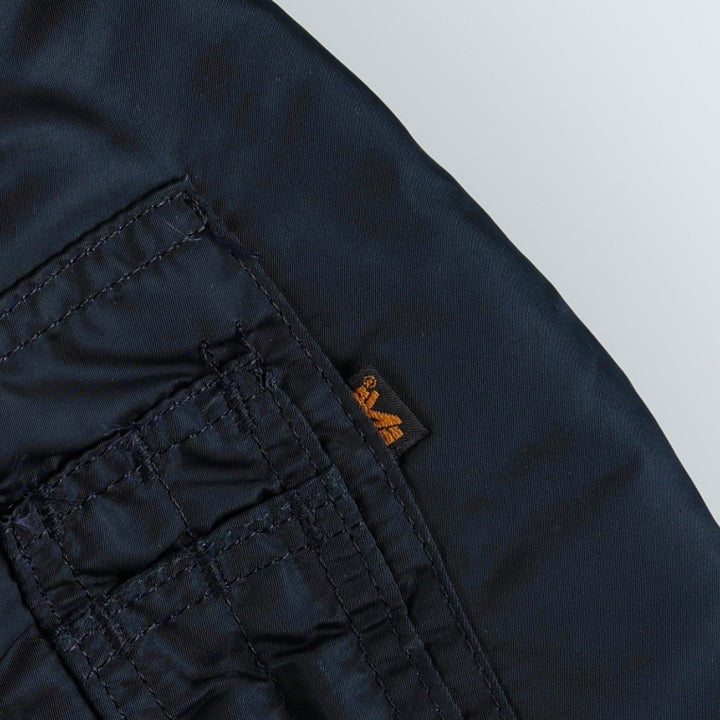 Civilian-made 1990'S Alpha Industries MA-1 type padded military flight jacket, made in the USA, size SMALL (equivalent to men's S). Nylon navy blue type Vintage Second Hand