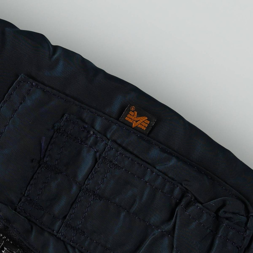 Civilian-made 1990'S Alpha Industries MA-1 type padded military flight jacket, made in the USA, men's size L equivalent, vintage. Nylon navy blue type Vintage Second Hand