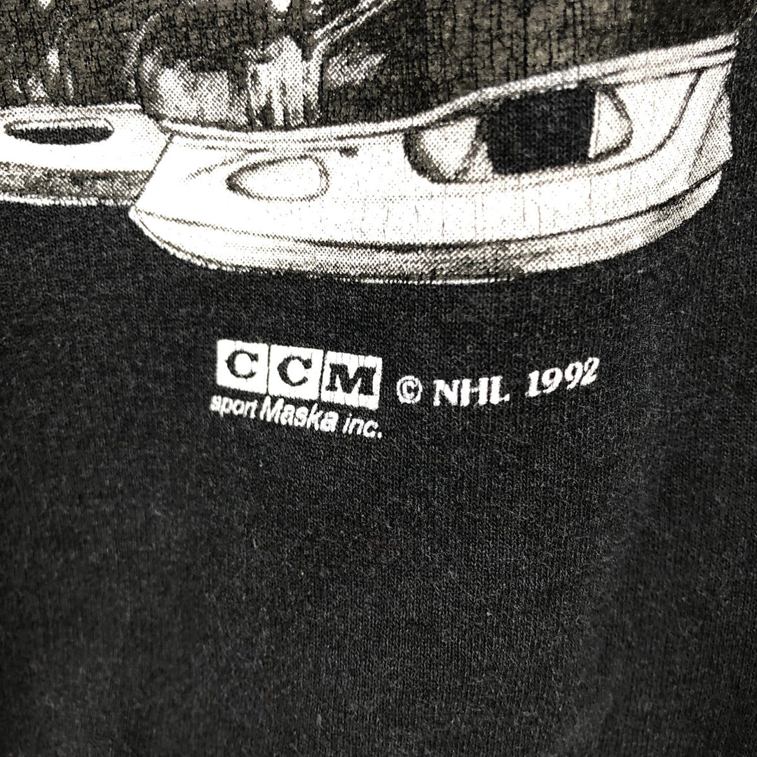 90'S NUTMEG NHL BOSTON BRUINS printed sweatshirt, made in Canada, men's size M equivalent. polyester black type Vintage Second Hand