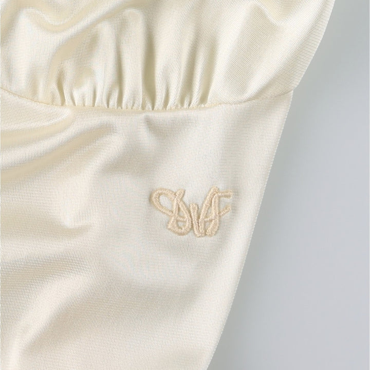 DIANE von FURSTENBERG midi-length lingerie camisole dress, made in the USA, women's size M equivalent. Nylon unbleached Vintage Second Hand