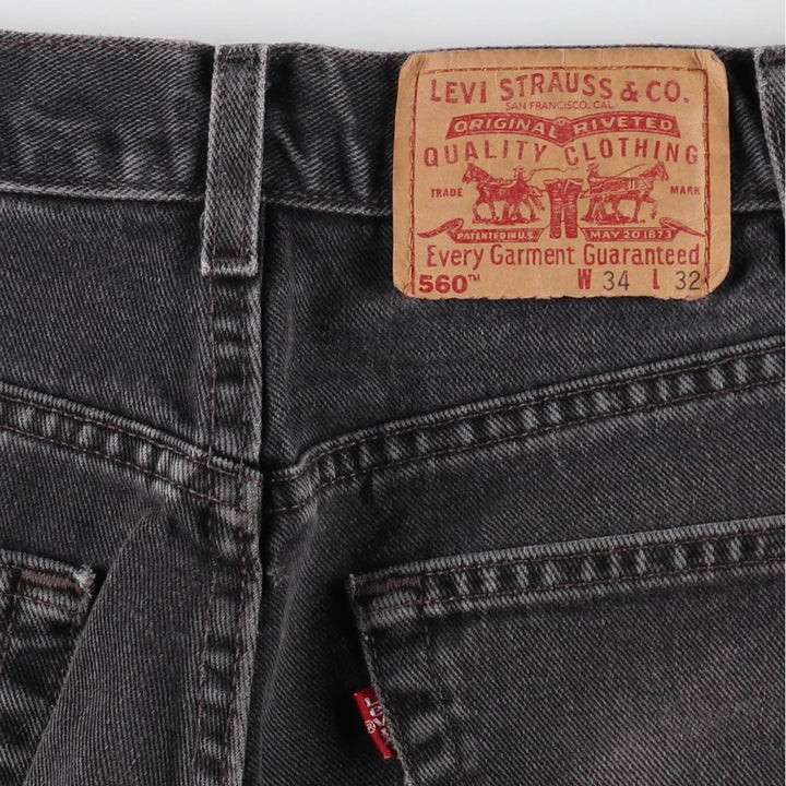 00'S Levi's 560 LOOSE FIT TAPERED LEG Black denim tapered denim pants made in USA men's w34 equivalent /evb008985